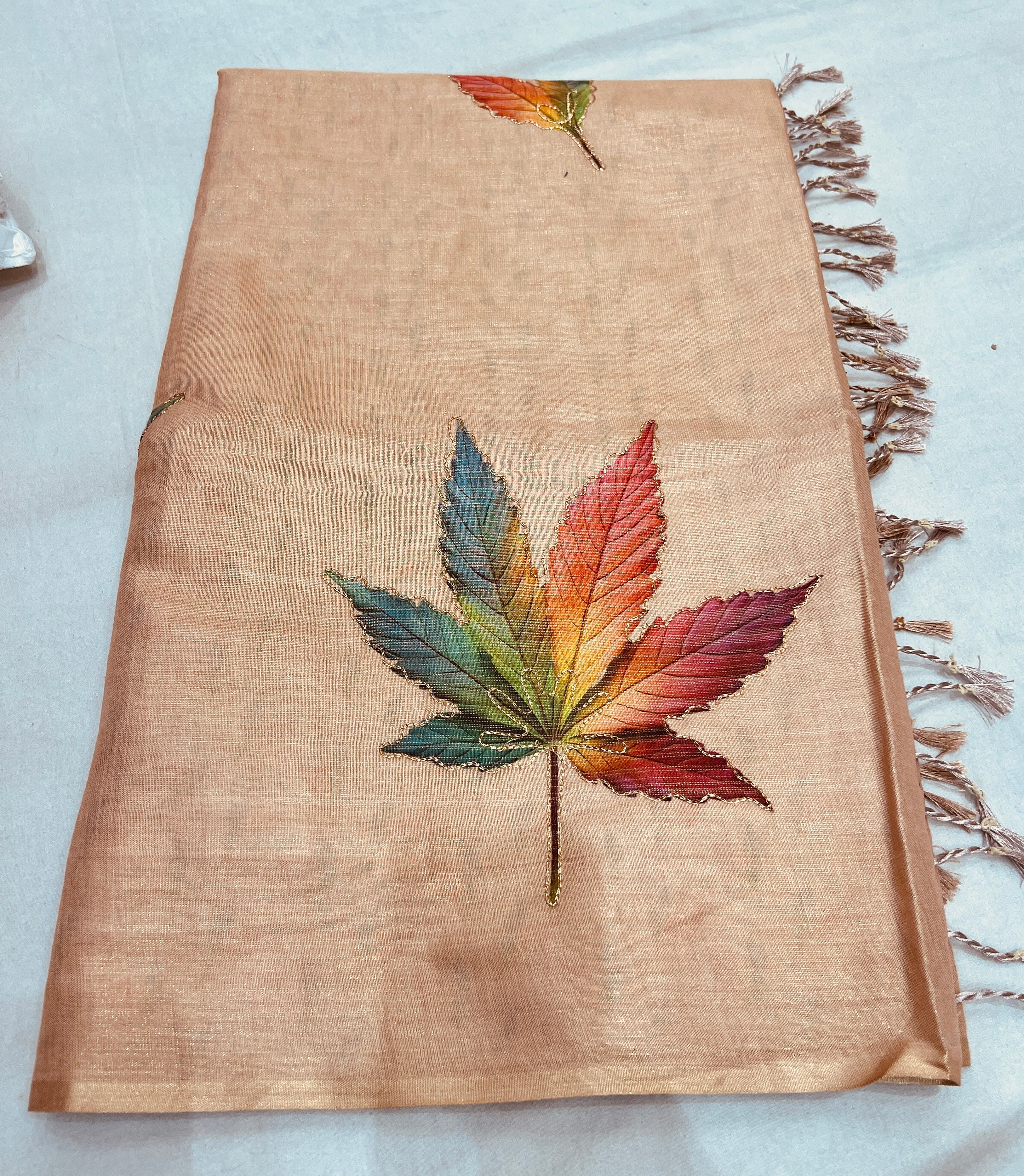 Peach Chanderi Cotton Saree with Multicolour Leaf Print & Tassel Pallu
